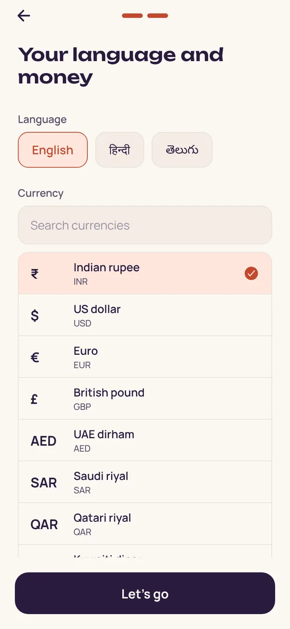 First-run setup: choose your language and currency.