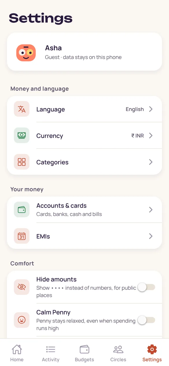 Settings screen with language, currency, accounts, and comfort options like Hide amounts and Calm Penny.